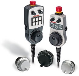 Hand-held pendant stations and handwheels